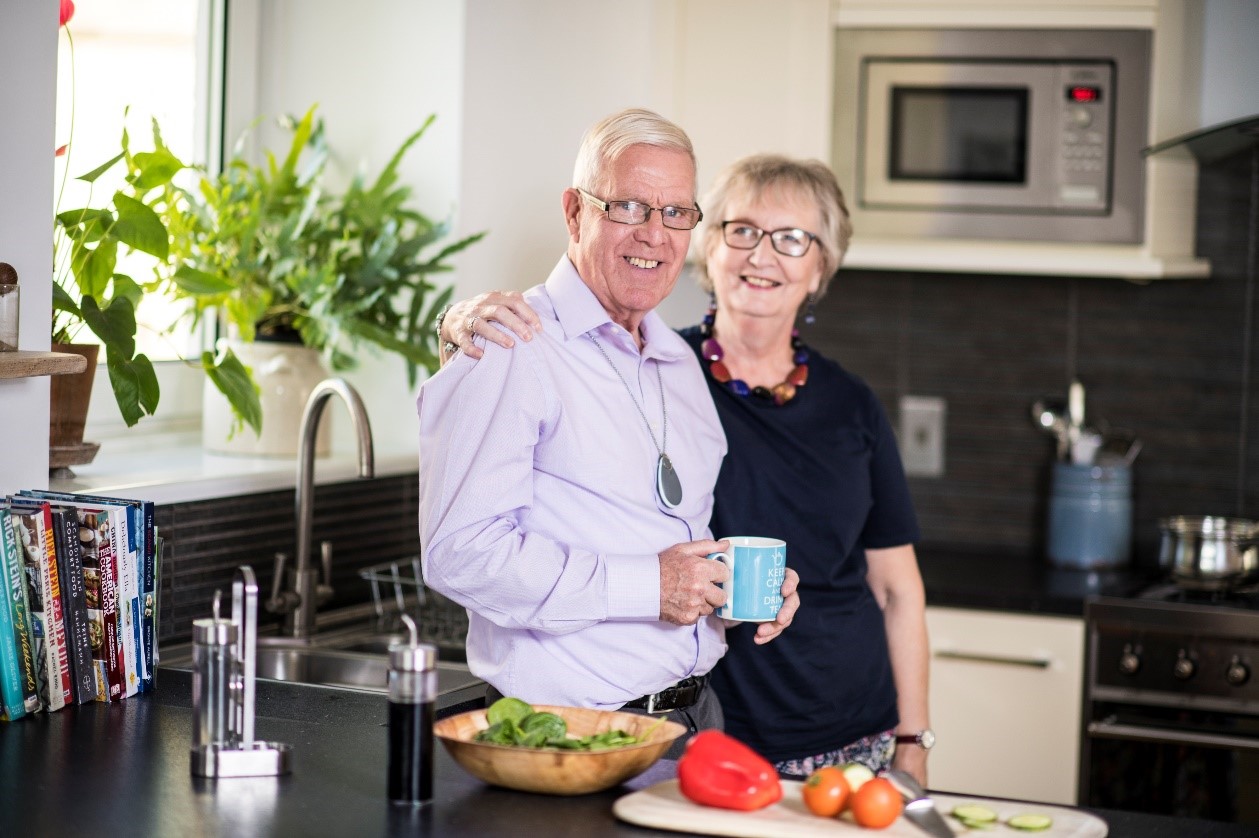 Couple in their kitchen